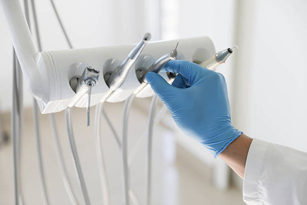 Professional Tooth Extraction technician working in Franklin County County, NC